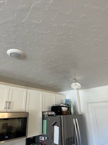 Flood damage from a failed tub drain — after