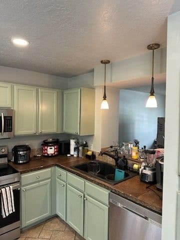 Kitchen ceiling and carpet water damage repair — after